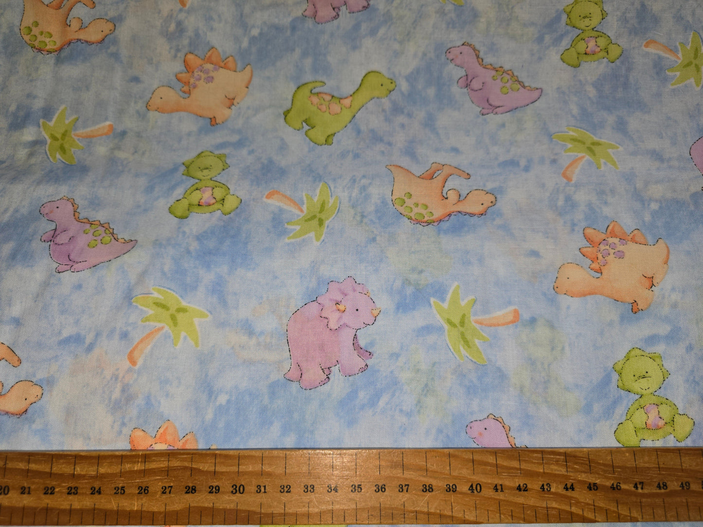 Springs Creative Cute a Saurus Animal Toss Dinosaurs Fabric 100% Cotton 112cm width