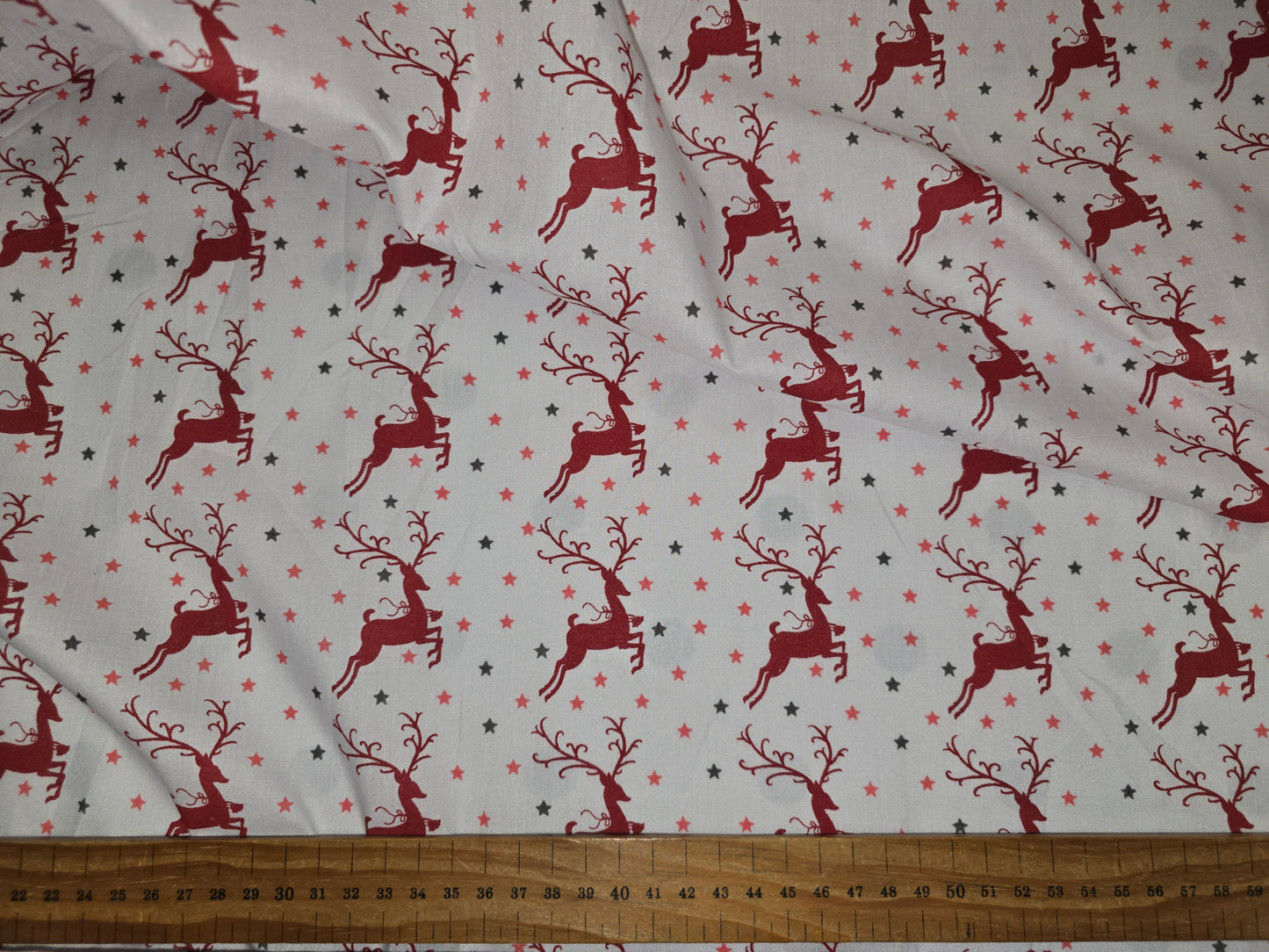 Polycotton Christmas Fabric Leaping Reindeer Red 112cm width