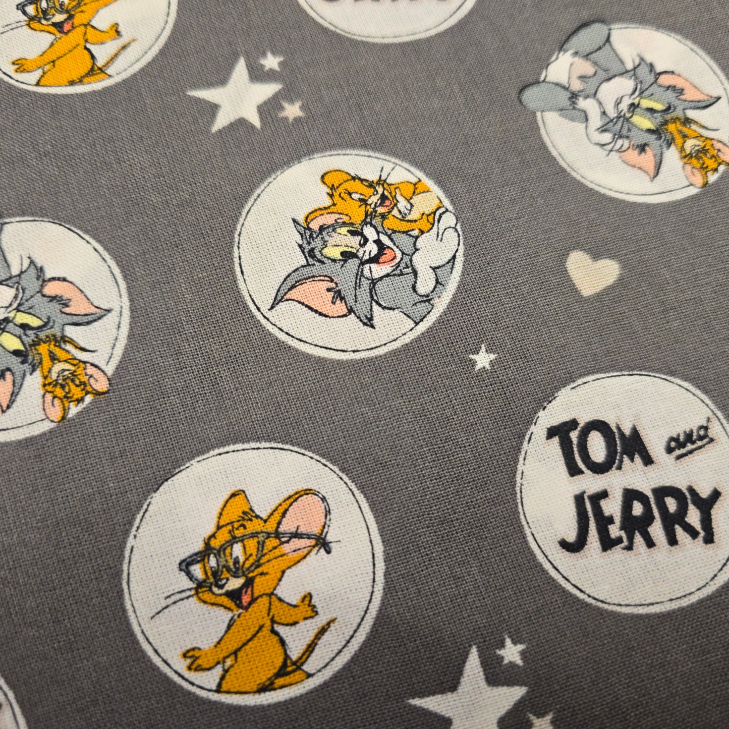 Tom and Jerry Cartoon Cotton Fabric on Grey by Camelot | 112cm Wide
