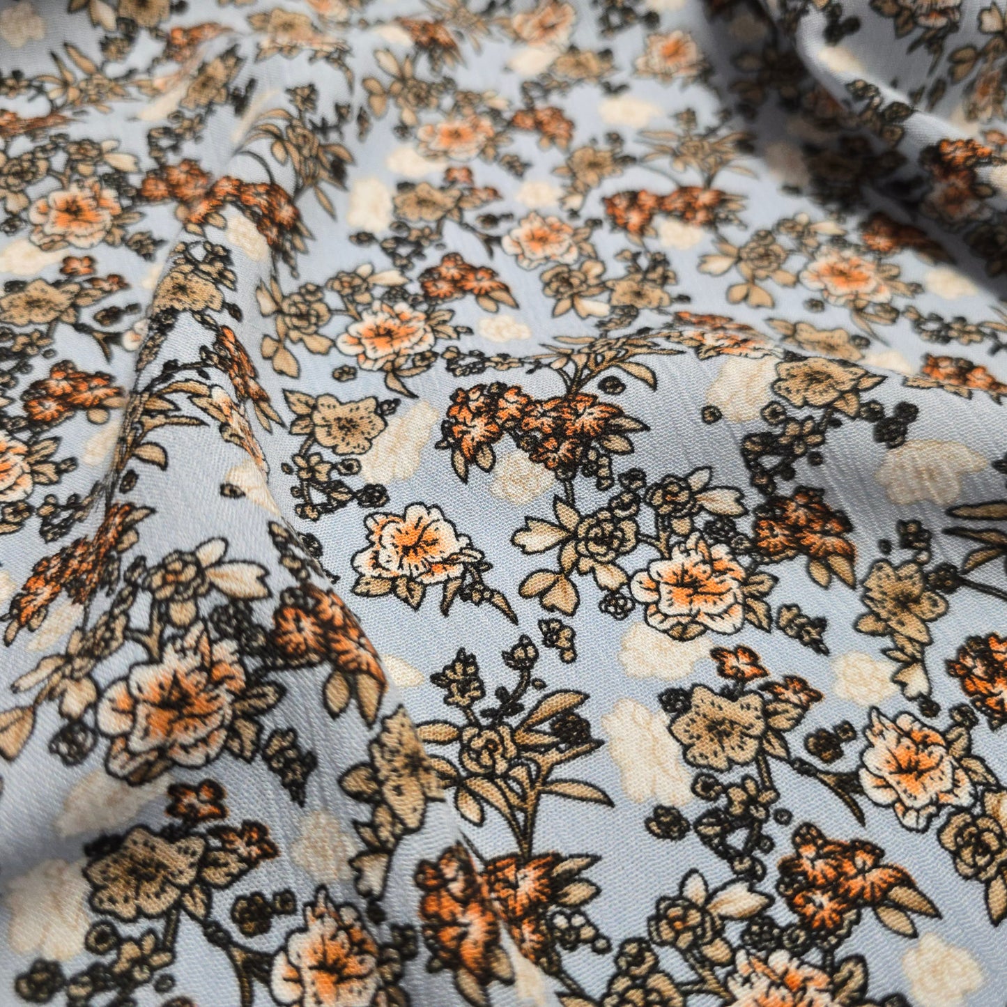 Crinkle Viscose Dress Fabric Beige Brown Orange Flowers on Blue 145cm Width