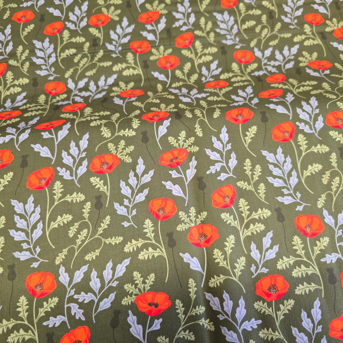 Craft Cotton Company Poppy Meadow on Green - 112cm Wide