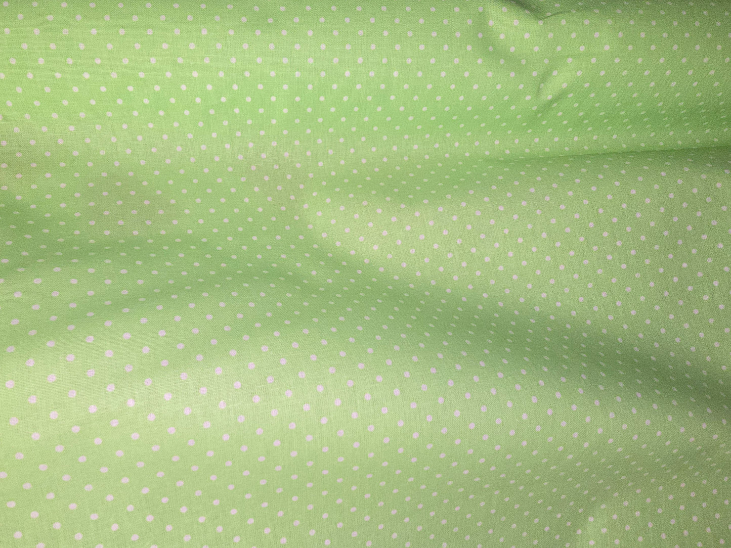 100% Cotton Apple Green Dot on White Super 150cm width perfect for Summer makes!