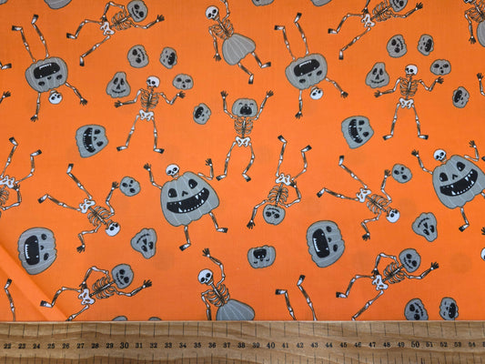 Polycotton Grey Pumpkins and Skeletons on Orange 112cm width