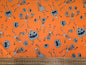 Polycotton Grey Pumpkins and Skeletons on Orange 112cm width