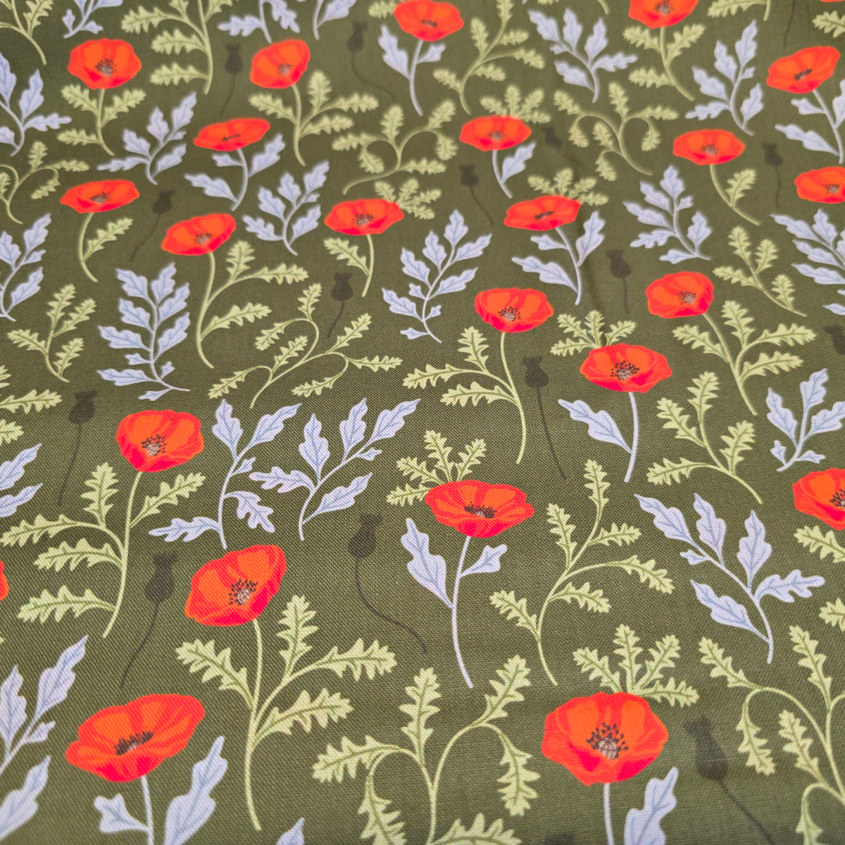 Craft Cotton Company Poppy Meadow on Green - 112cm Wide