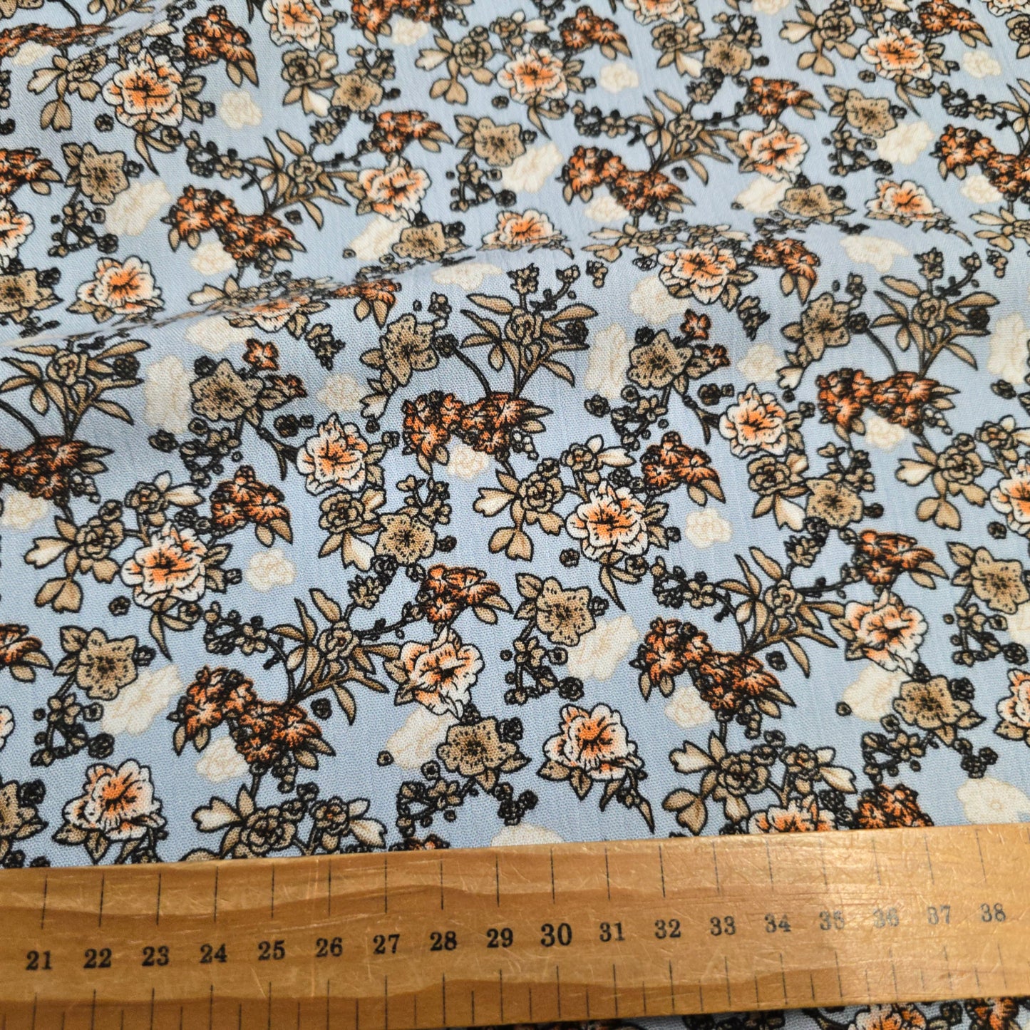 Crinkle Viscose Dress Fabric Beige Brown Orange Flowers on Blue 145cm Width