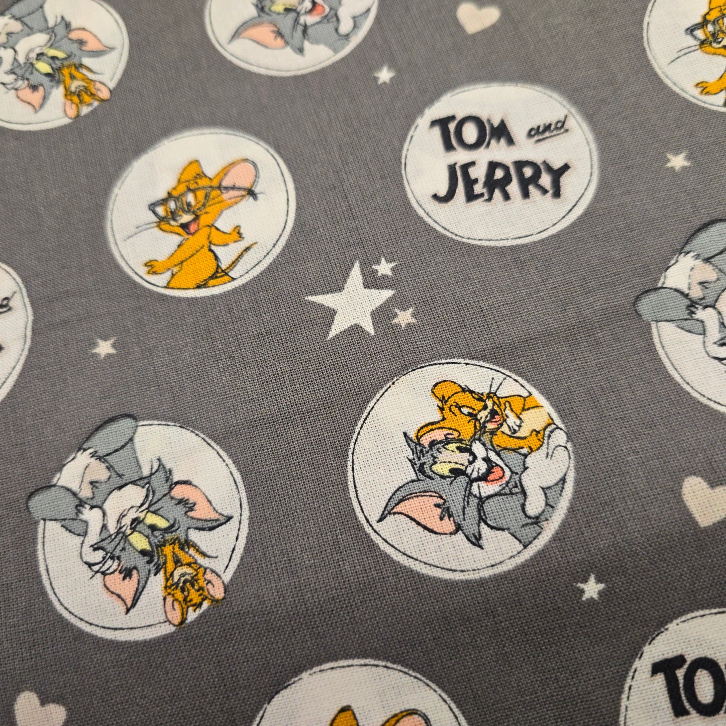 Tom and Jerry Cartoon Cotton Fabric on Grey by Camelot | 112cm Wide