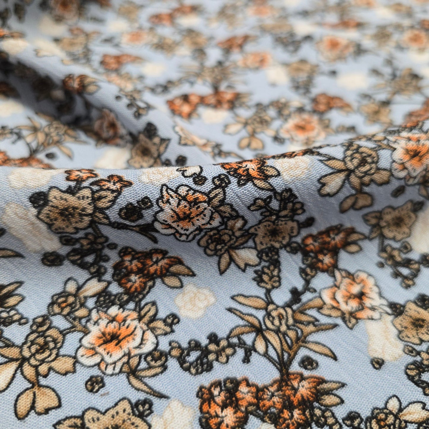 Crinkle Viscose Dress Fabric Beige Brown Orange Flowers on Blue 145cm Width