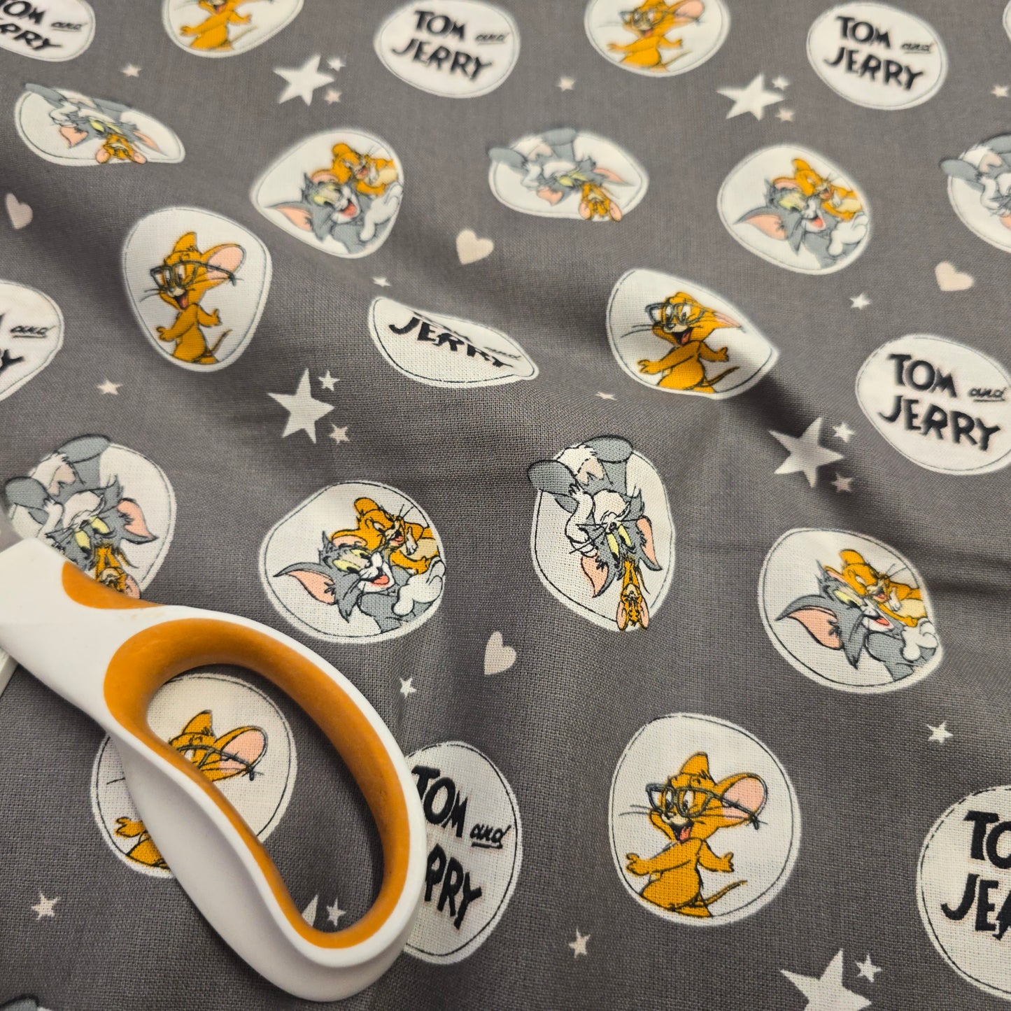 Tom and Jerry Cartoon Cotton Fabric on Grey by Camelot | 112cm Wide
