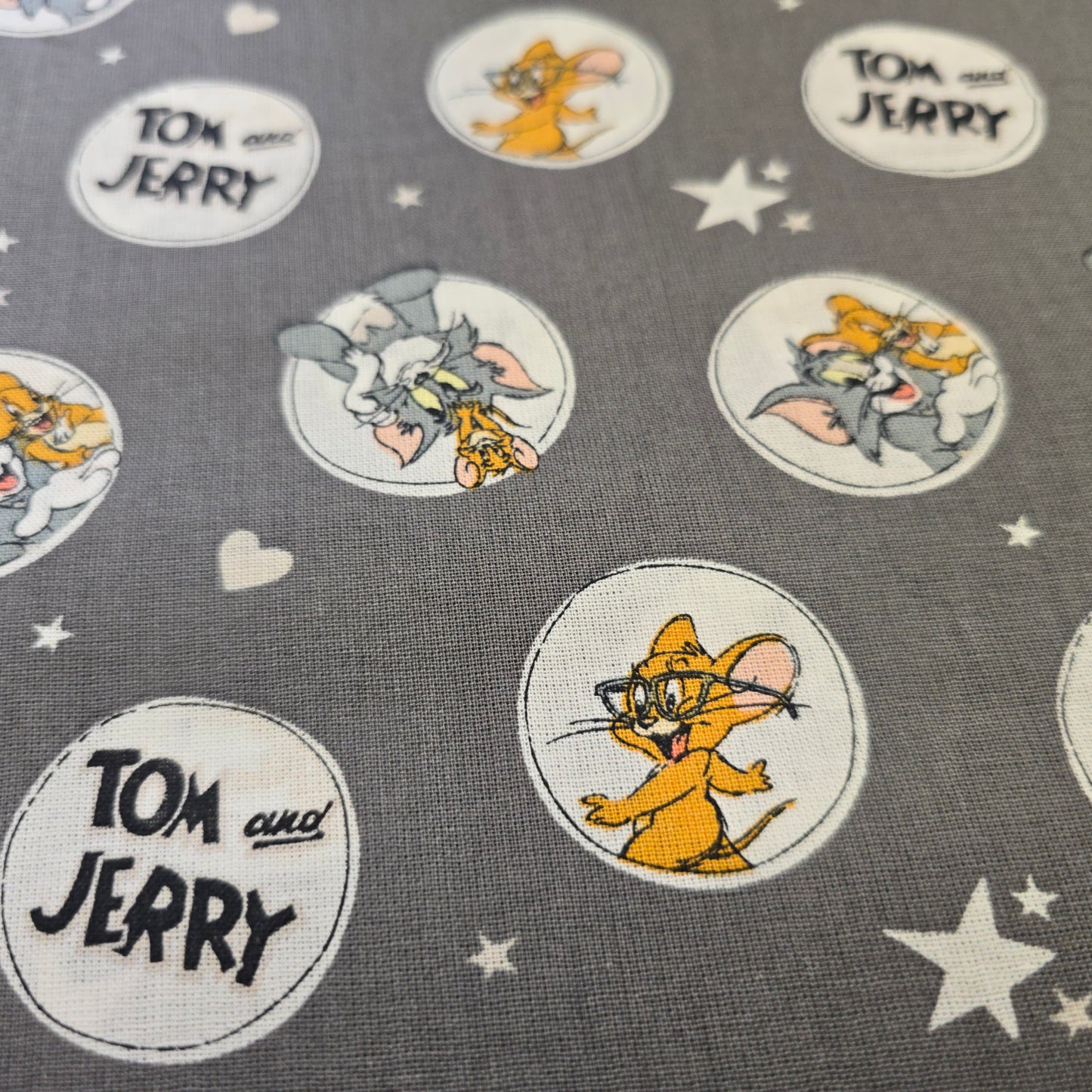 Tom and Jerry Cartoon Cotton Fabric on Grey by Camelot | 112cm Wide